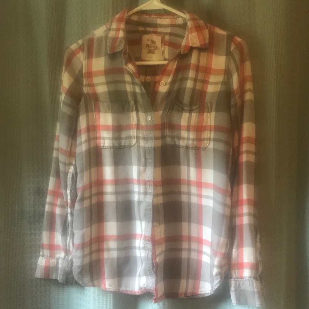 Button down plaid shirt.